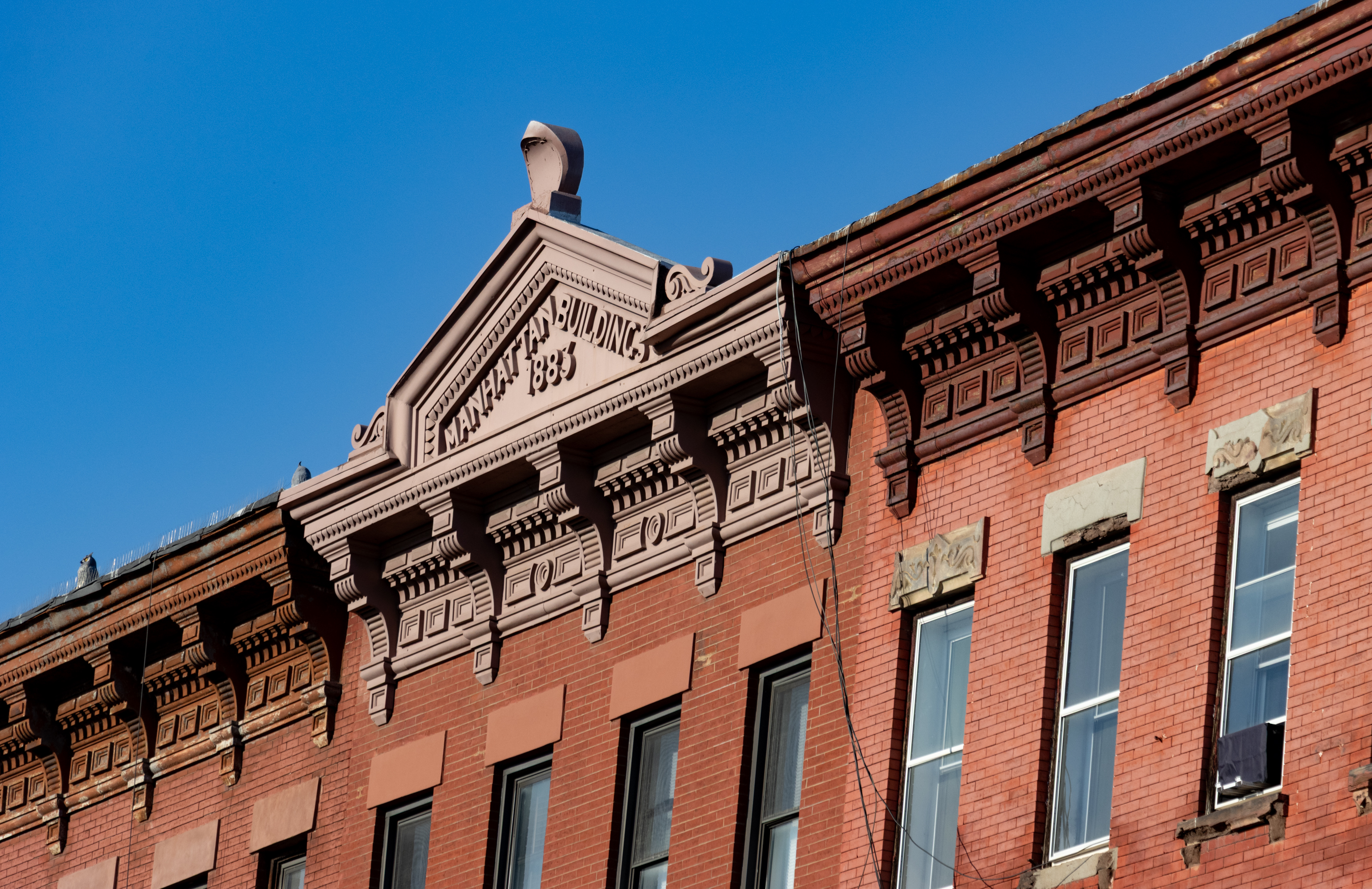 brooklyn - cornices on brick buildings on manhattan avenue