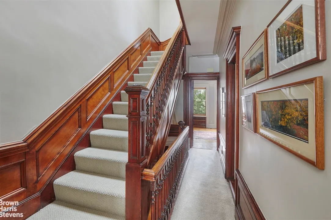 upstairs hall with carpet, original wood stair
