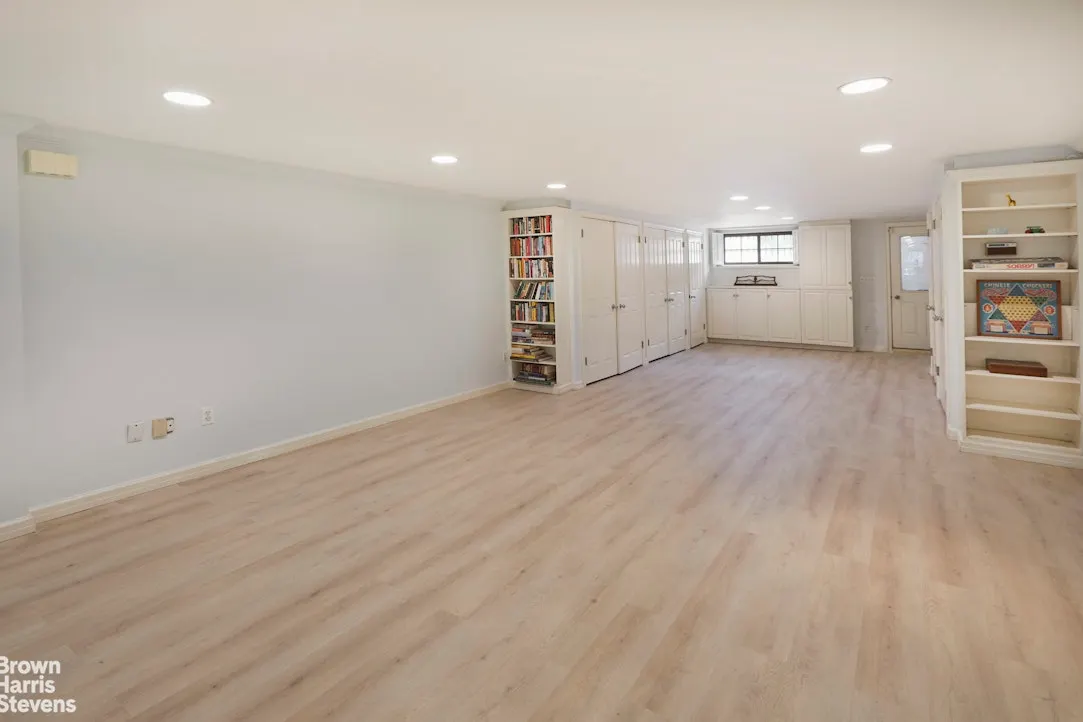 garden level with built-in storage, recessed lighting