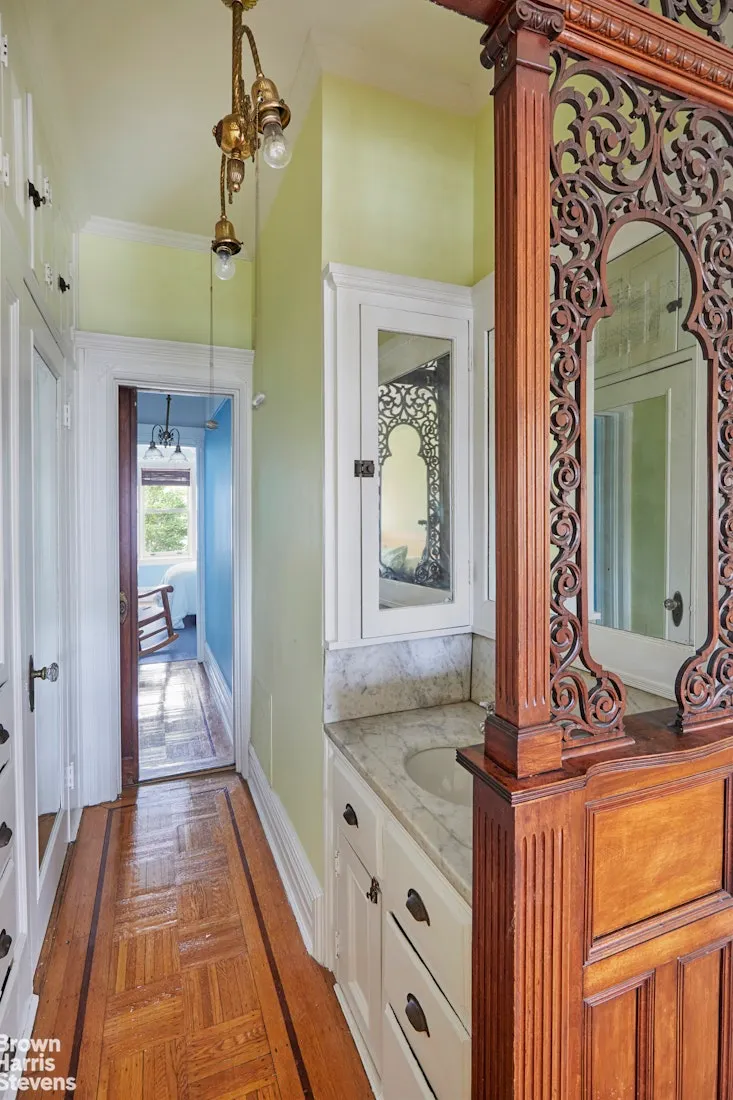 passthrough with marble sink, fretwork