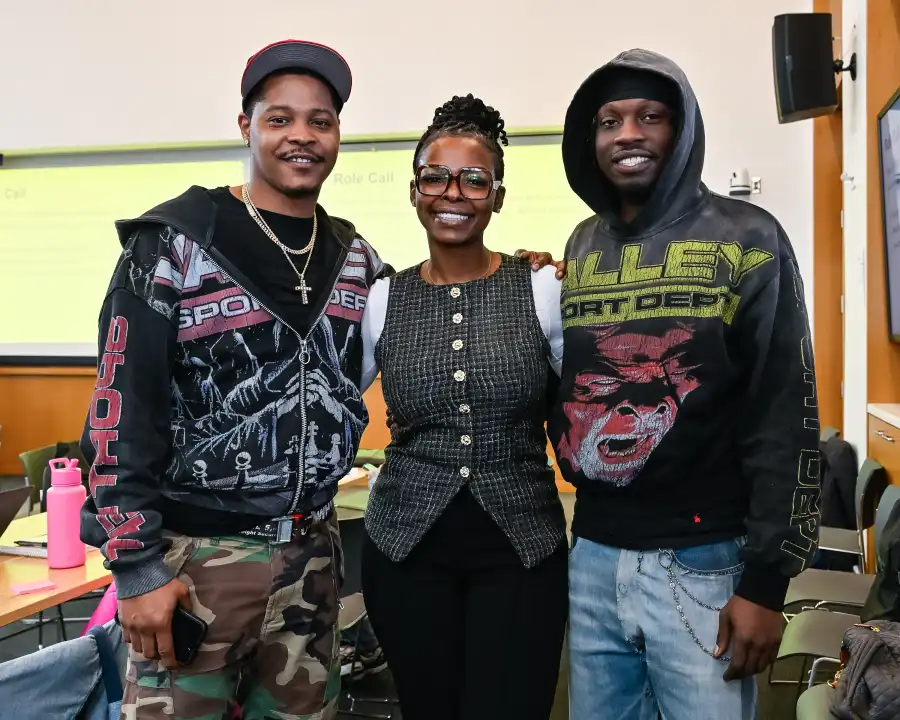 a group of people posing for the camera