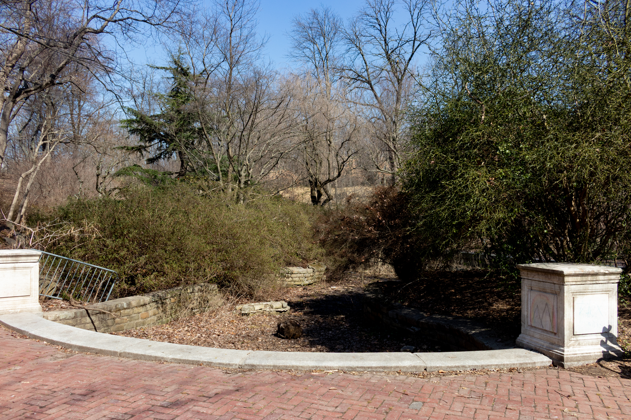 brick paths and a fountain without water
