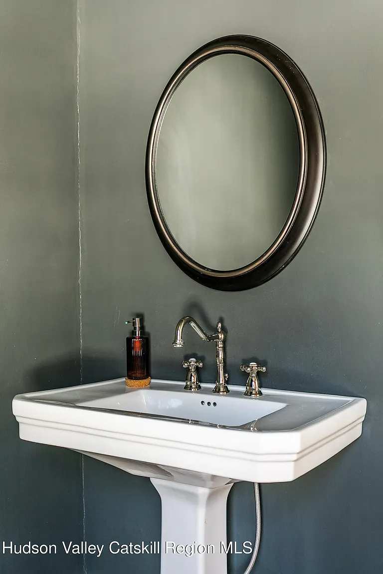 bathroom with pedestal sink