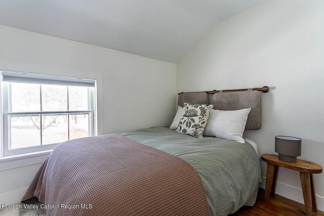 bedroom with white walls