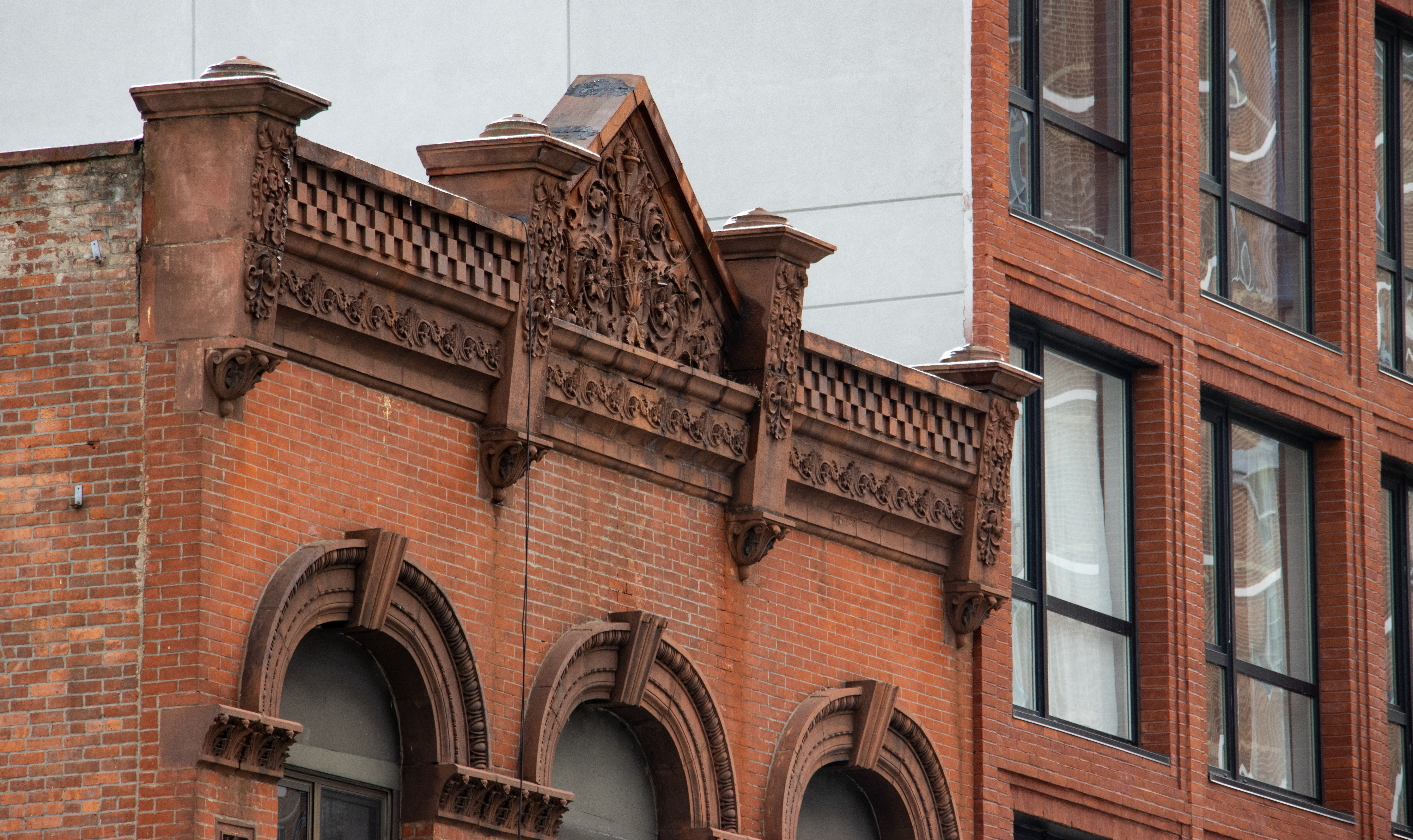 brownstone details on a brick building