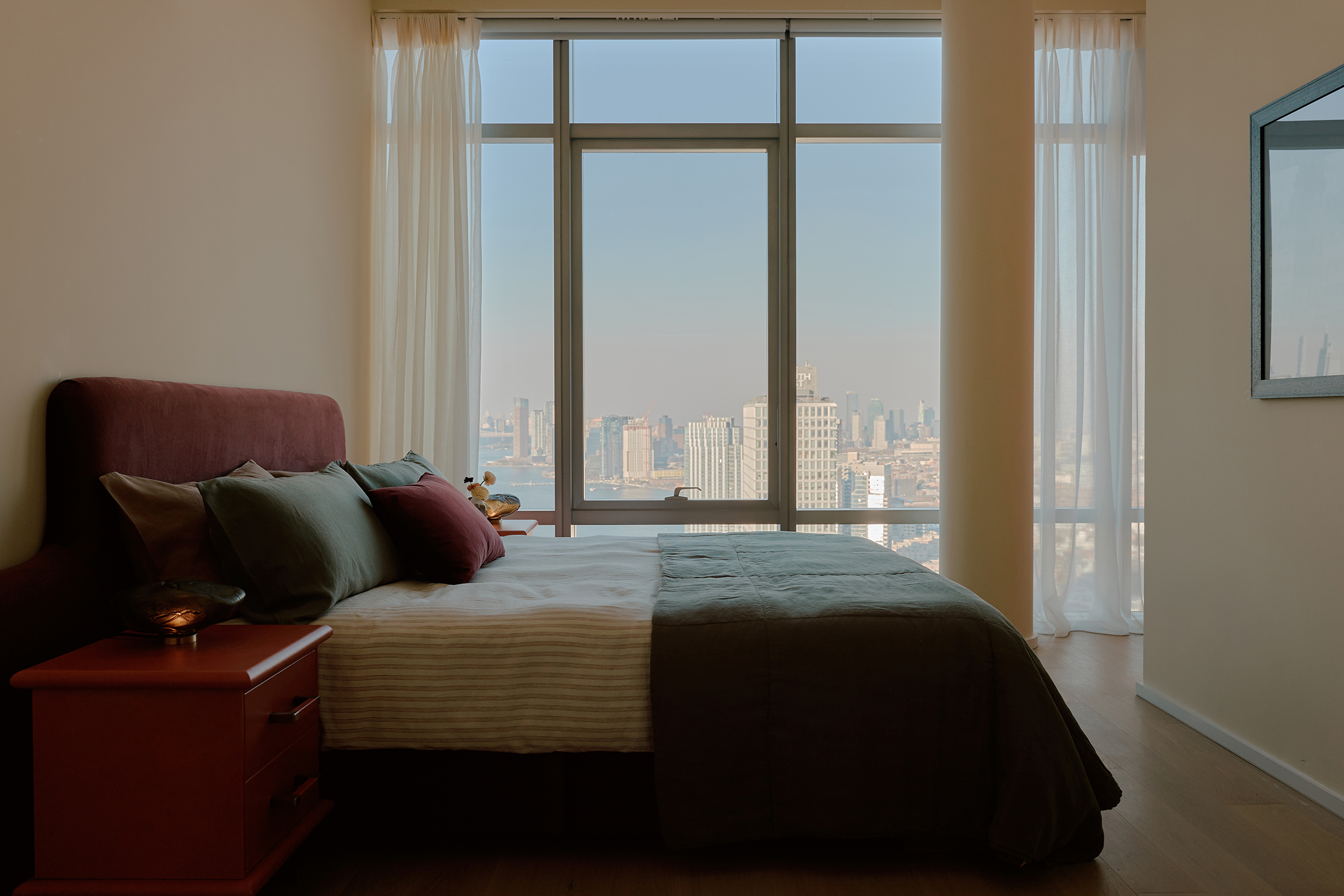 bedroom with floor to ceiling windows