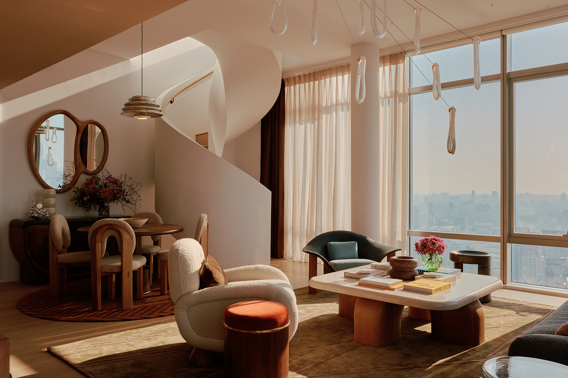 living room with sculptural staircase