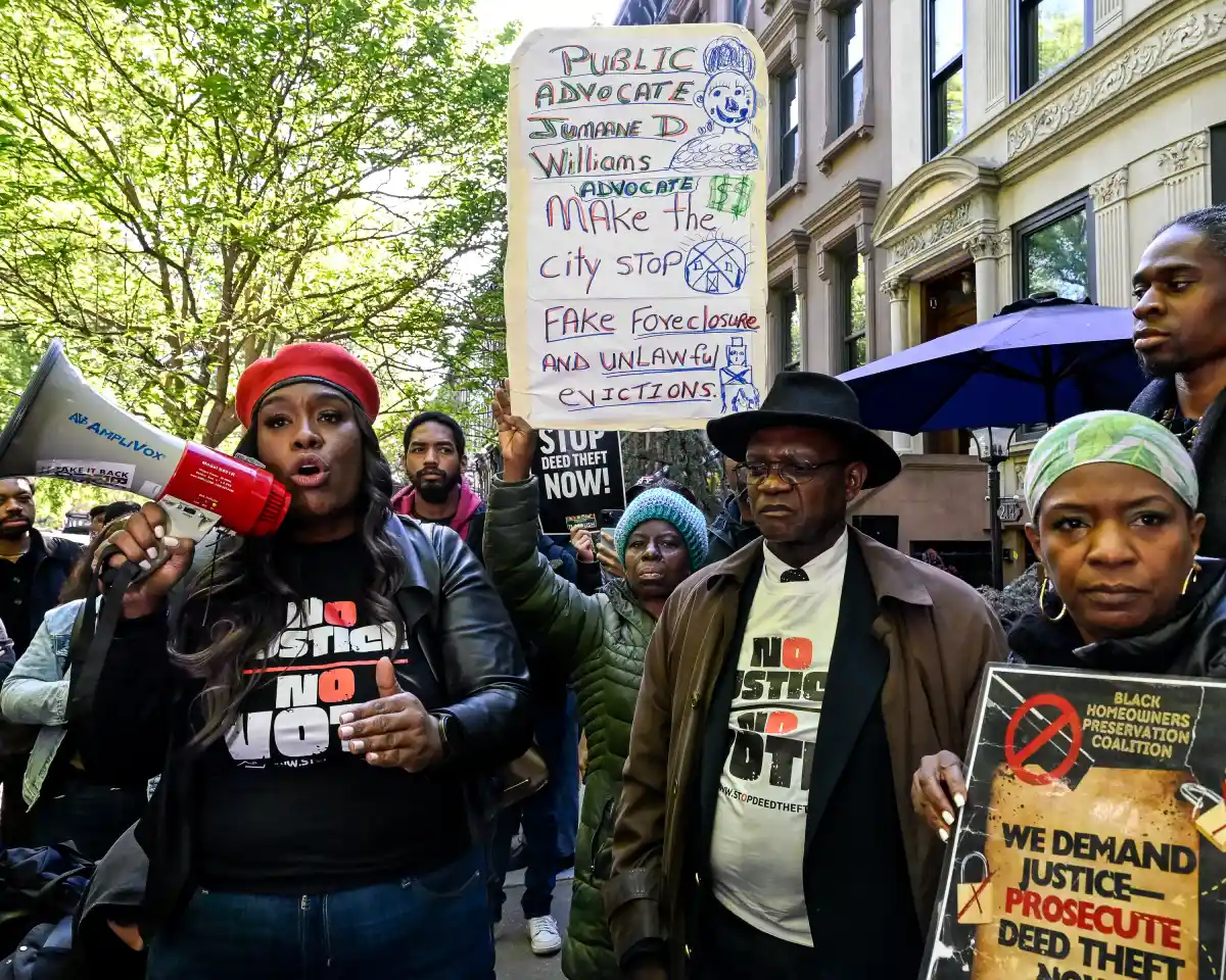 people holding protest signs