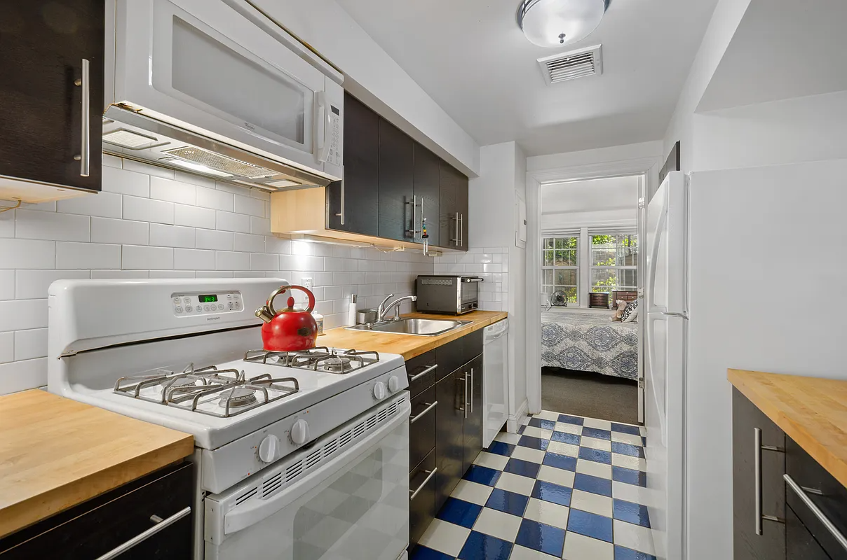 kitchen with blue and white checkerboard floor