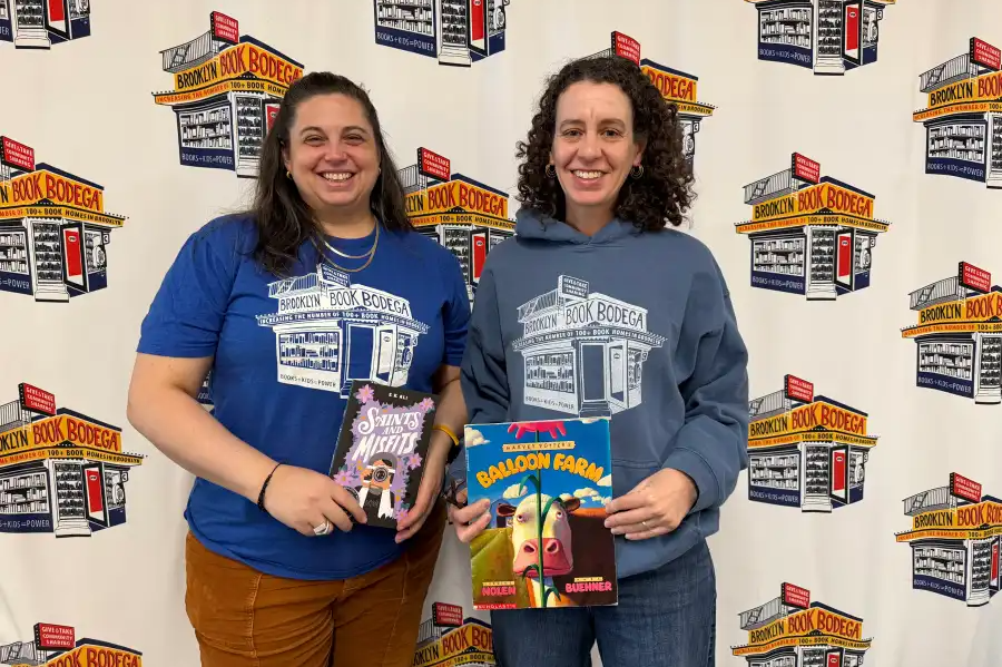 brooklyn book bodega founders posting with books