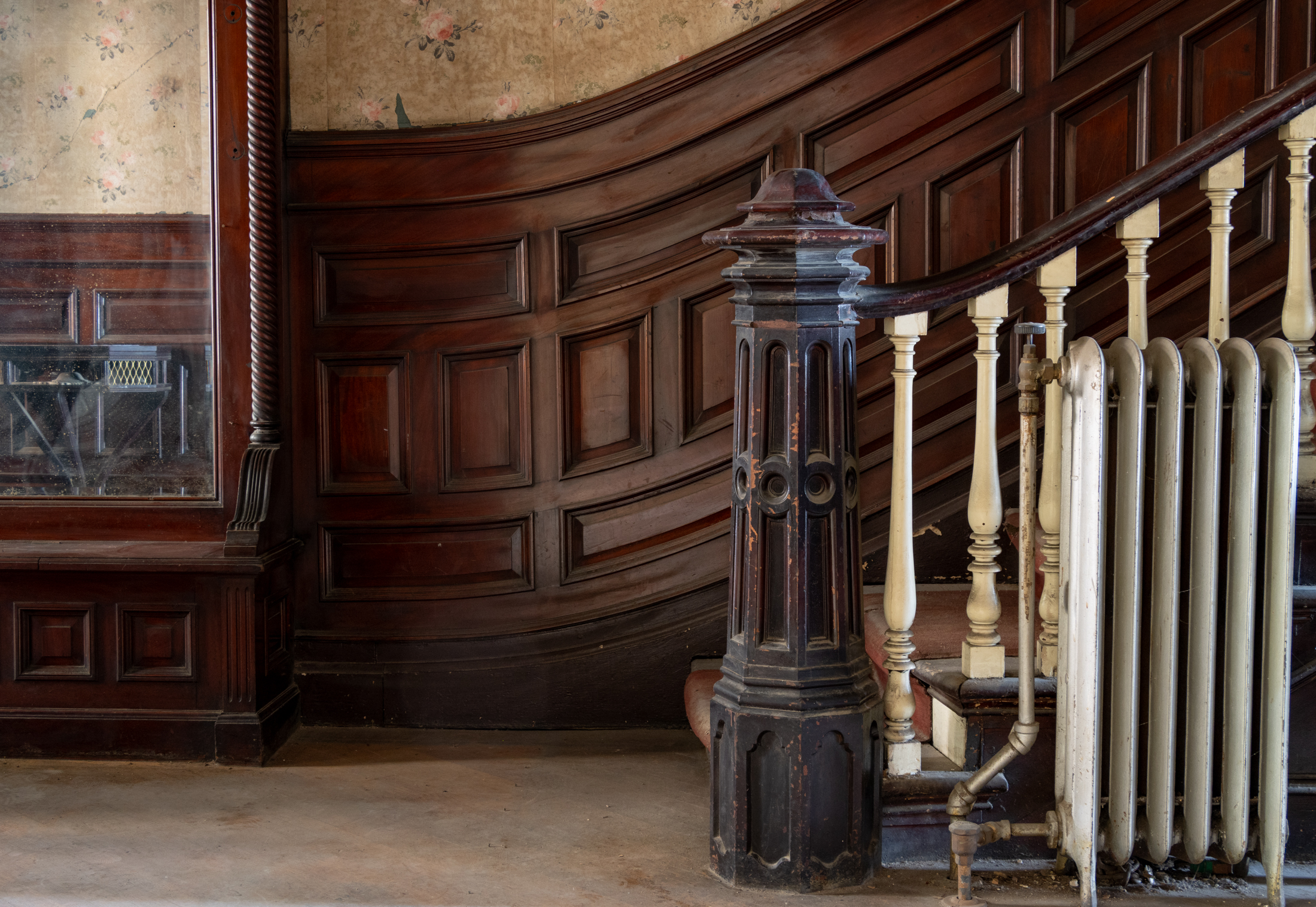 mirror in a hallway and a stair