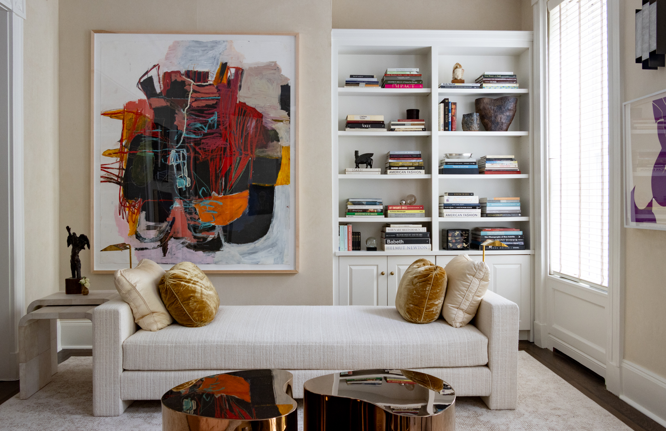 brooklyn heights showhouse - parlor with cream day bed and copper tables