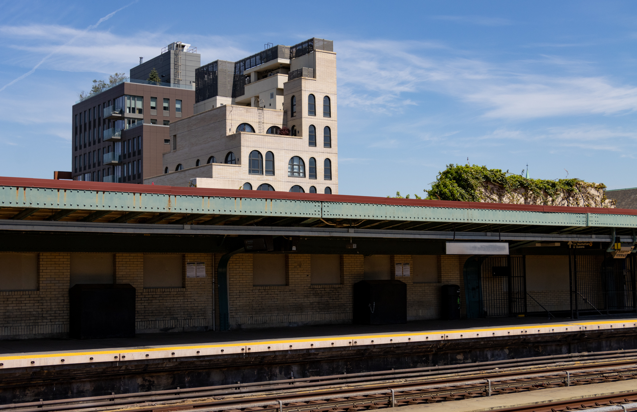 brooklyn - view of subway tracks with large buildings rising in the distance