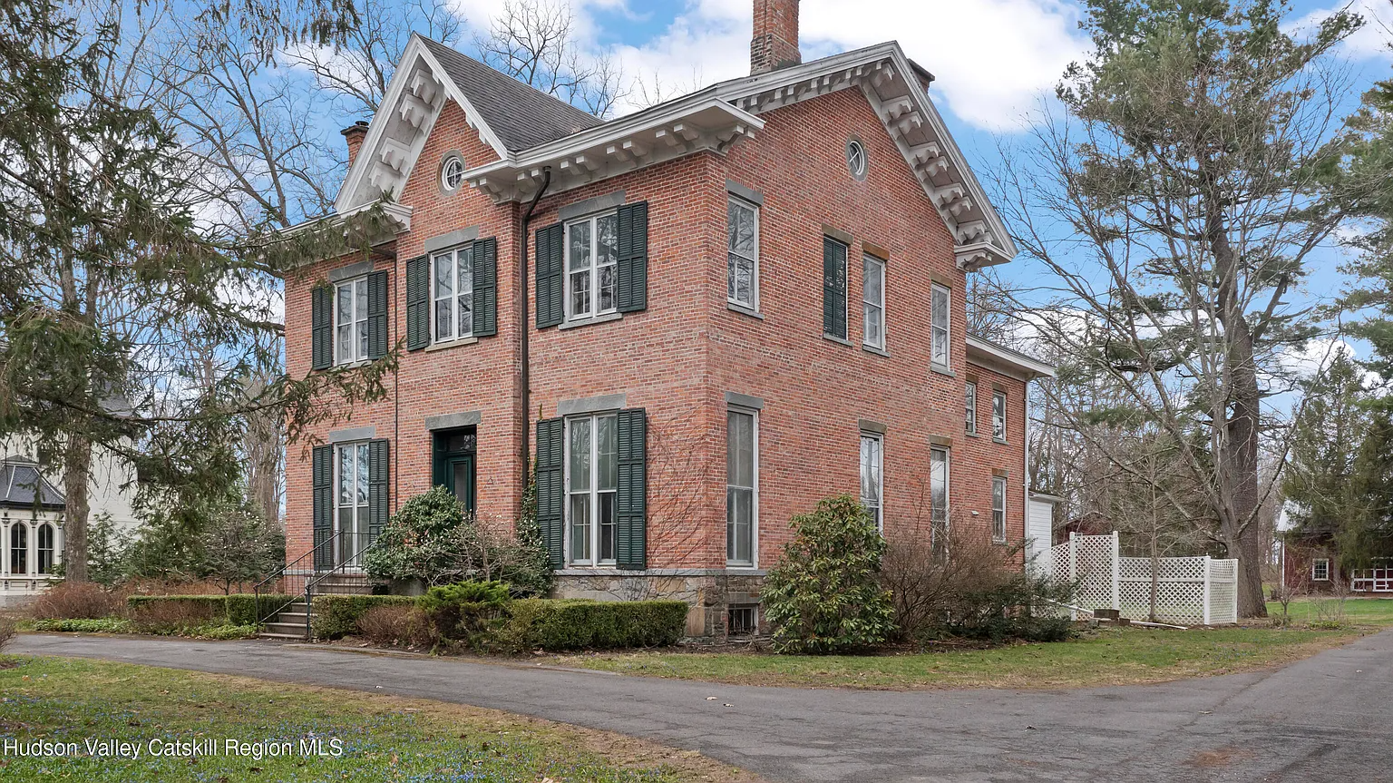 brick house with peaked gables