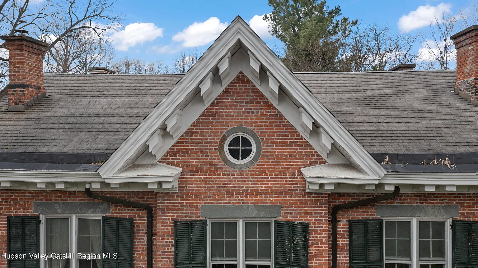 peaked gable on brick house