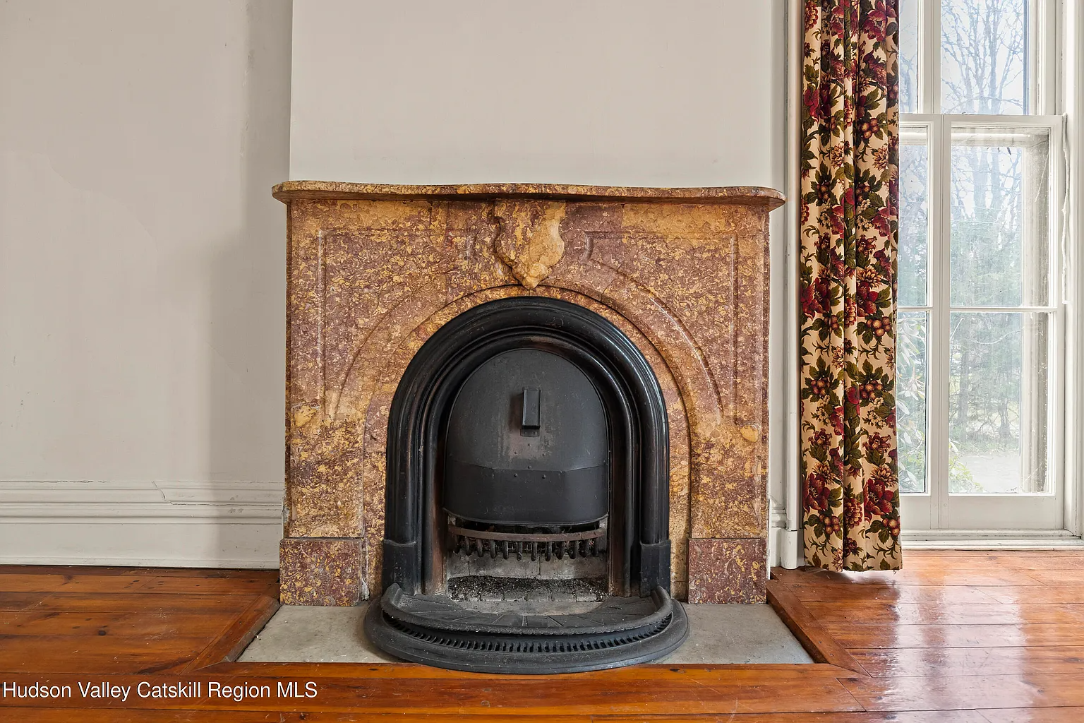 marble mantel with an insert