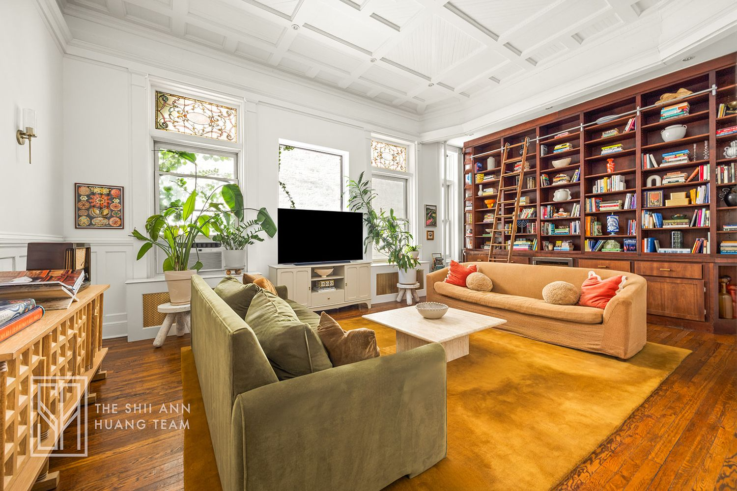 brooklyn living room with wood floor, stained glass