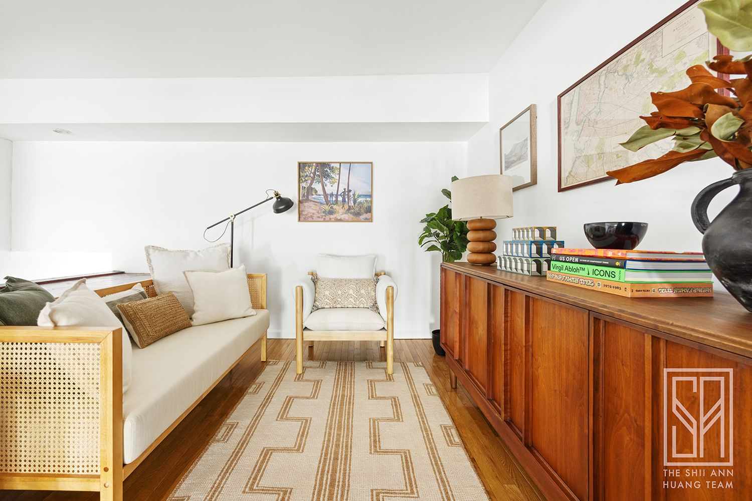 loft space with room for a sofa and storage