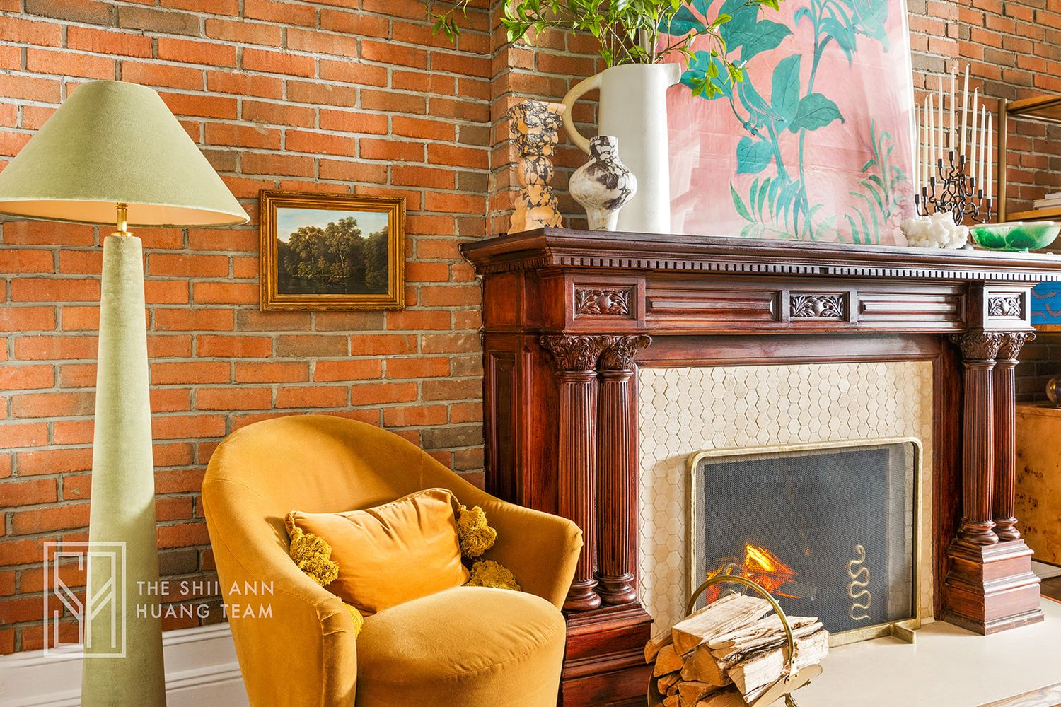 wood mantel with modern tile surround in dining area