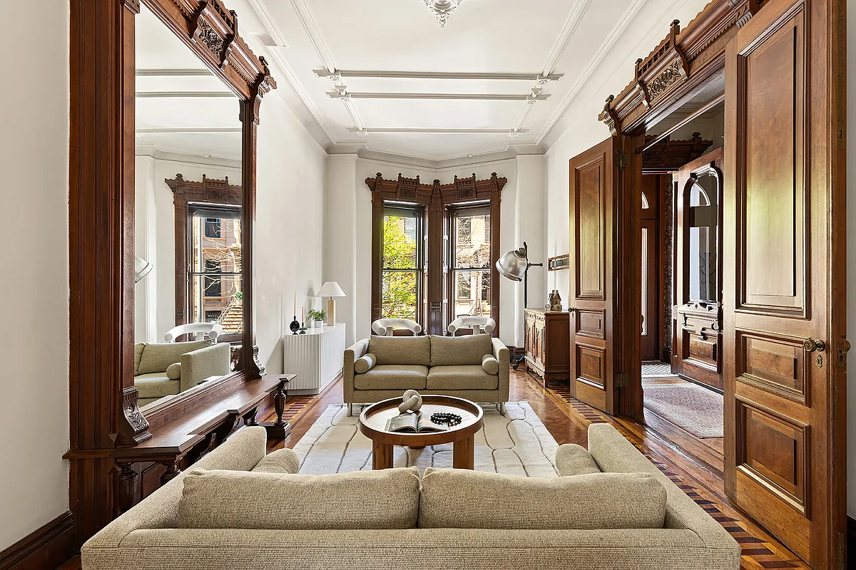 park slope - parlor with wood moldings, pier mirror, wood floor