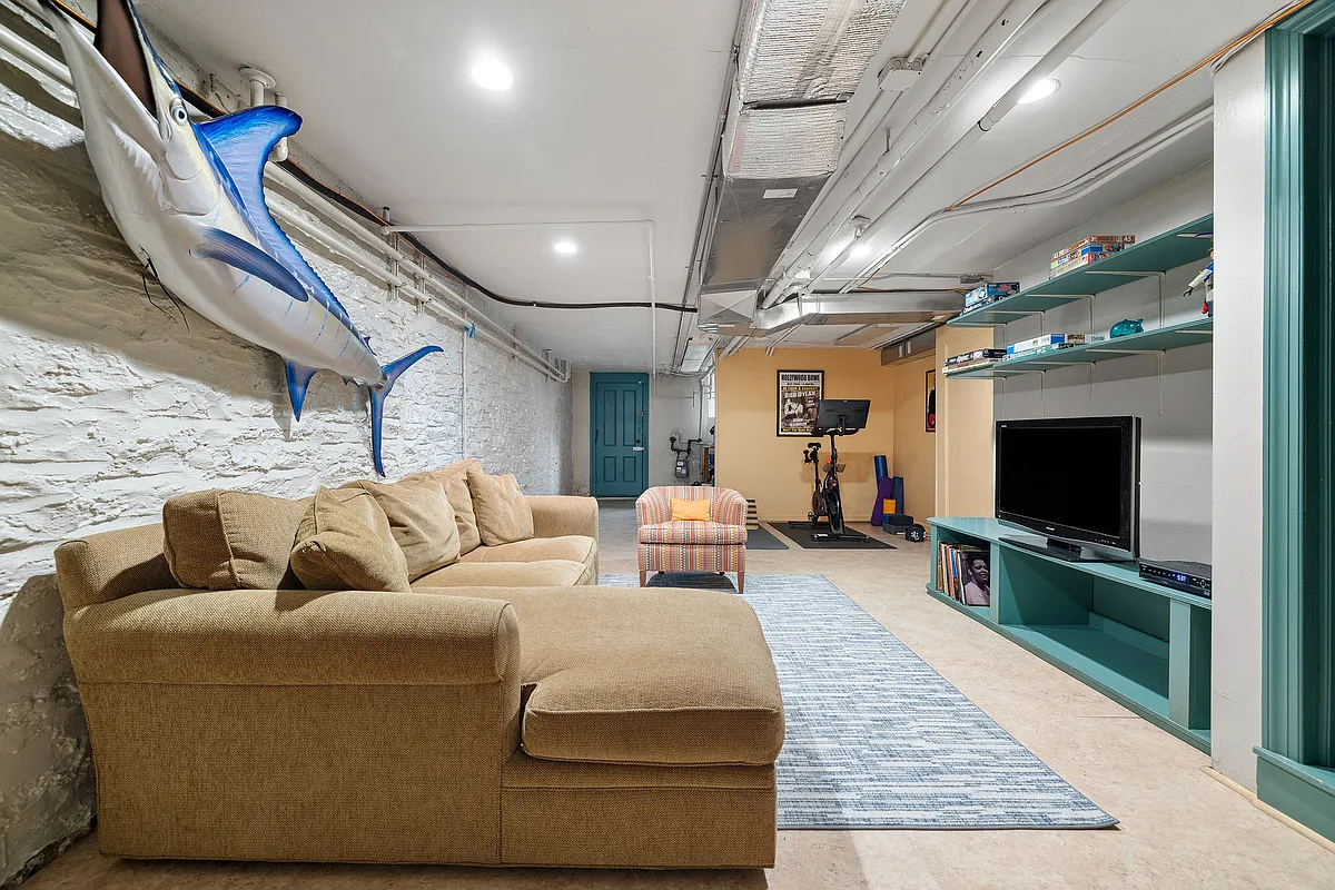 garden level with a tile floor, rec room