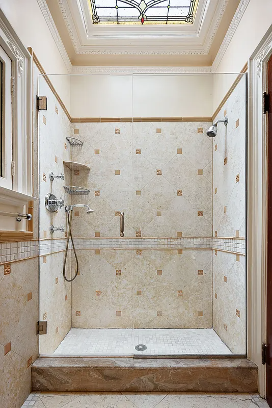 bathroom with large shower, stained glass skylight