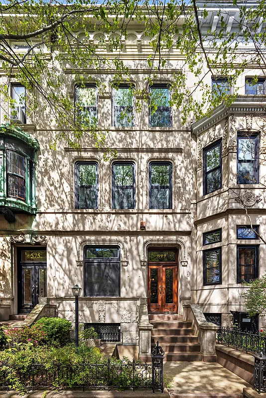 limestone exterior with a stoop