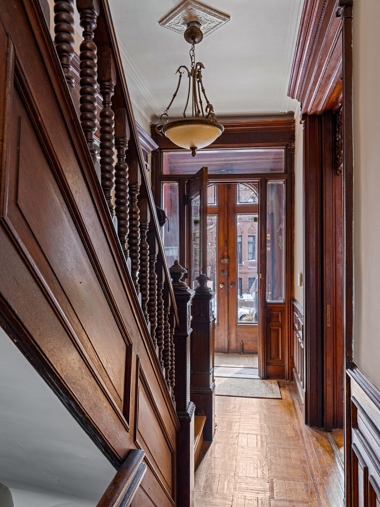 entry hall with original stair, wood floor