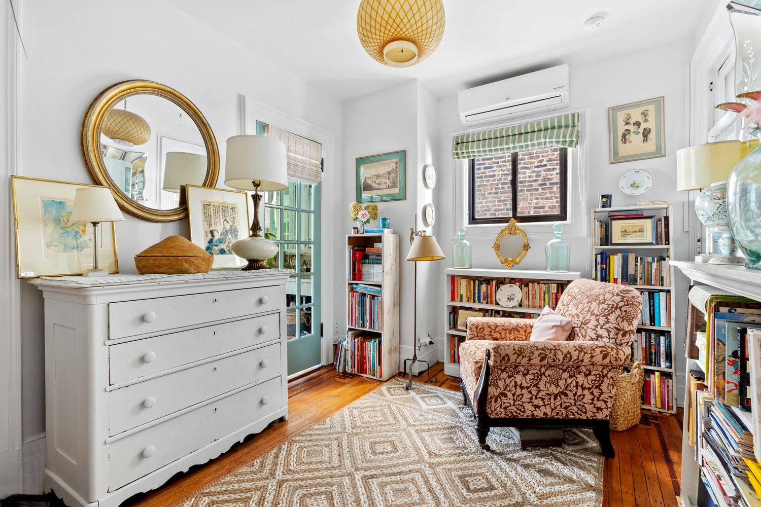 small bedroom with French door to another bedroom