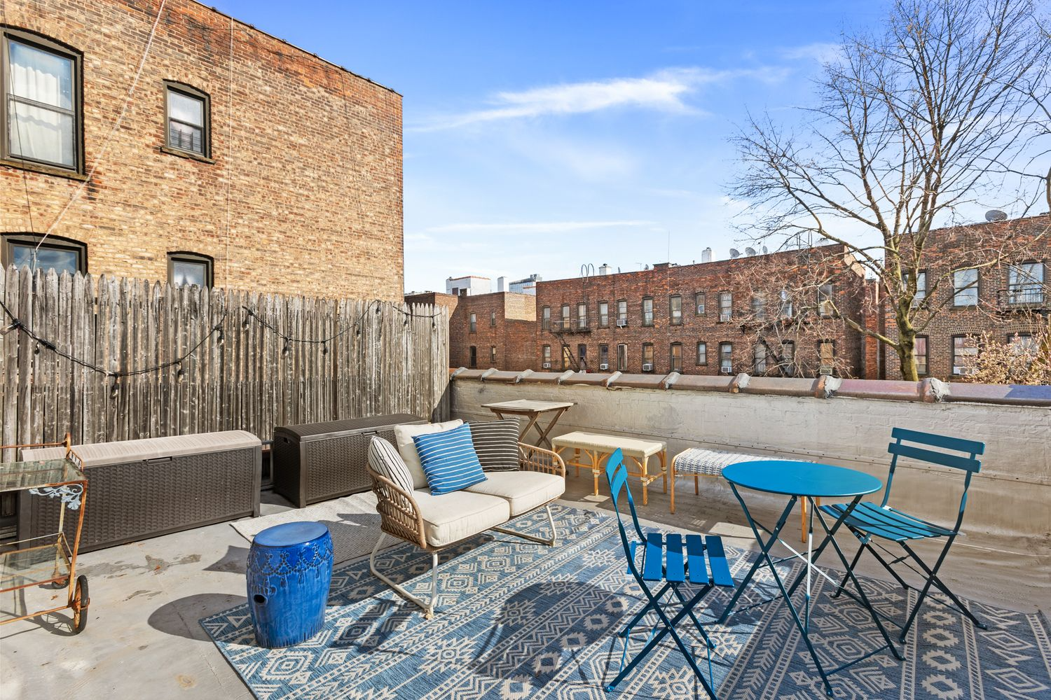 top floor deck with room for dining, seating