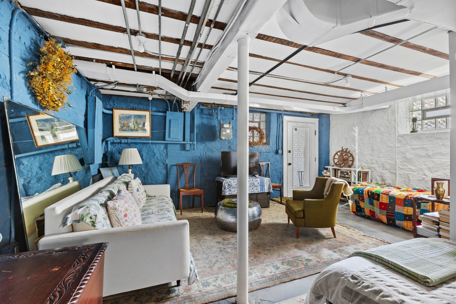 garden level with two blue walls, glass door to front vestibule