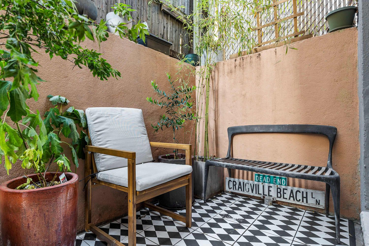 terrace with room for seating and containers of plants