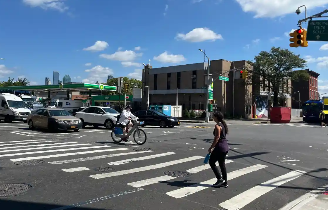 traffic and pedestrian on a busy street