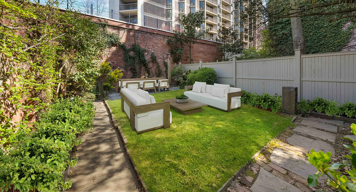 rear yard with virtually staged furniture showing room for seating and dining