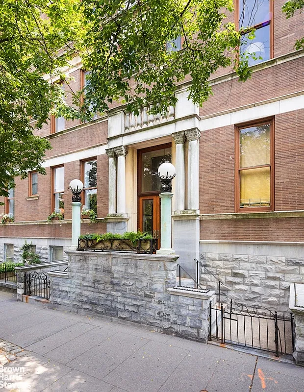 brick building with stoop to entrance