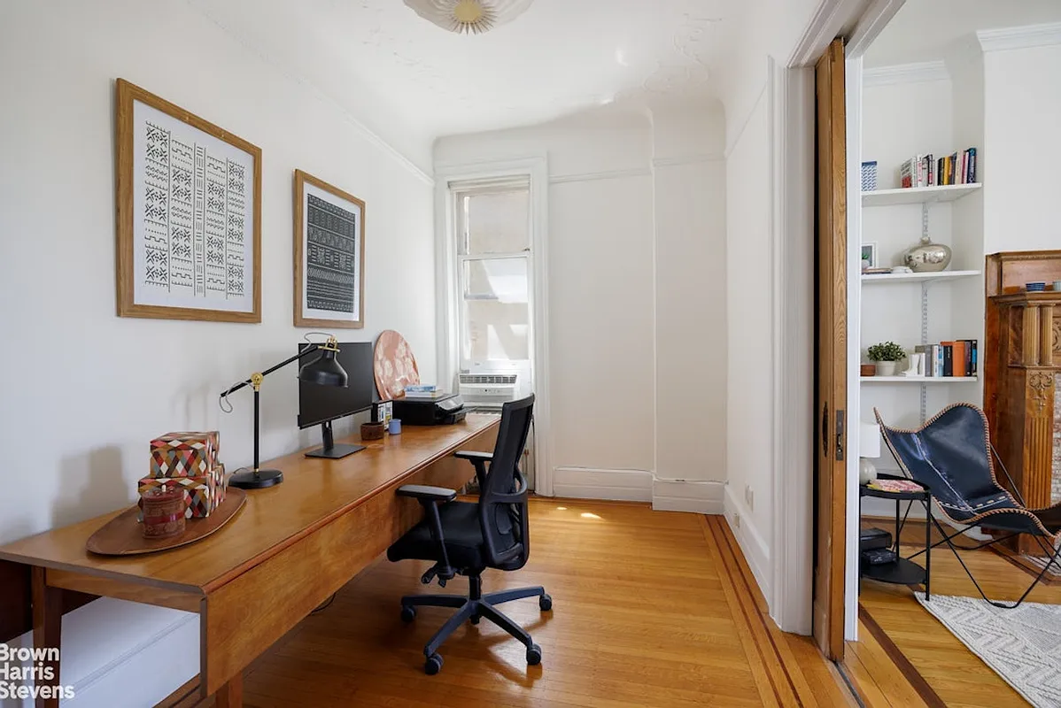 windowed study off the living room with pocket door
