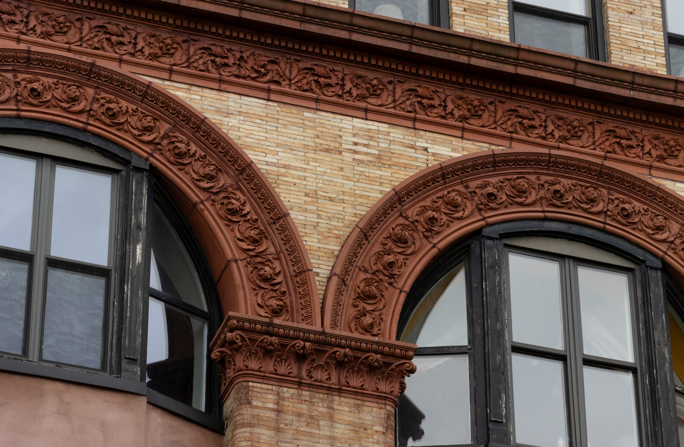 brooklyn - terra cotta details on a brick building