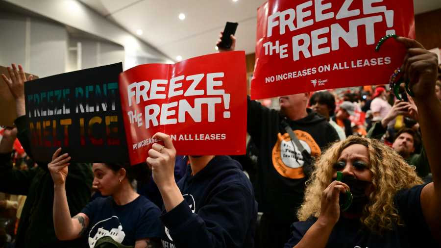 people holding signs