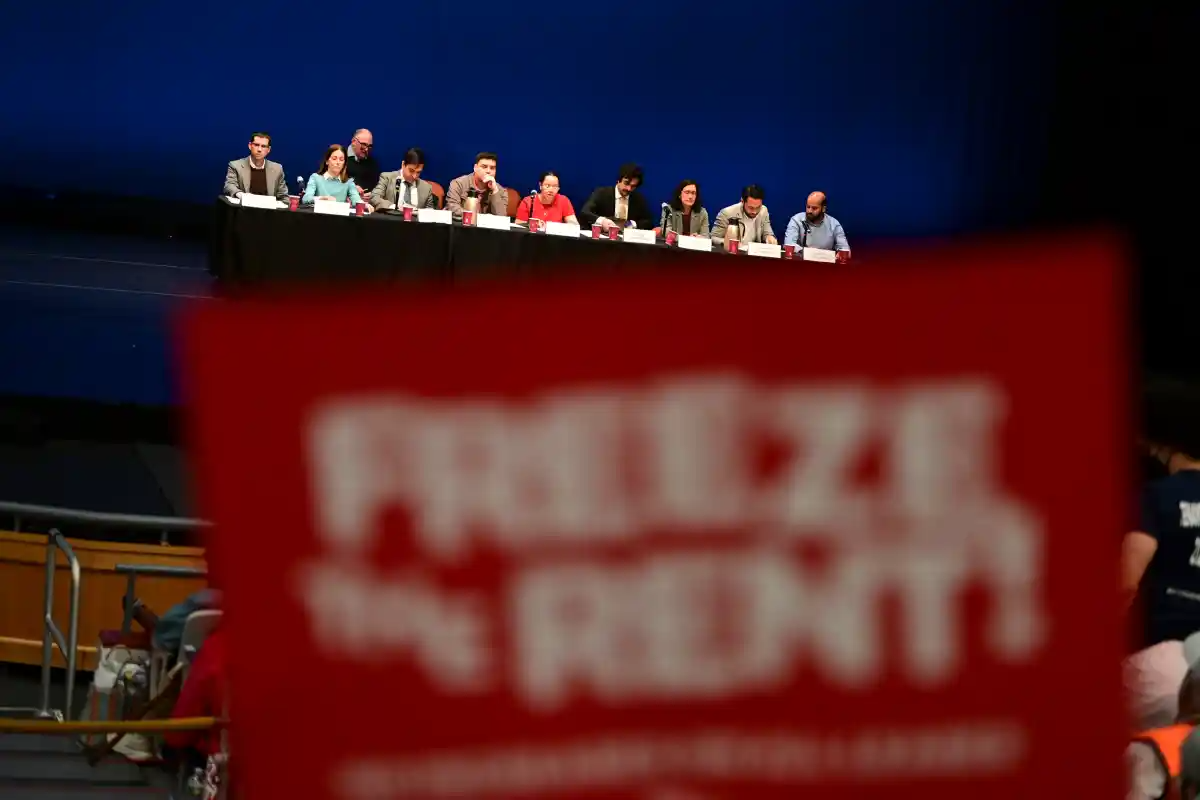 sign saying freeze the rent