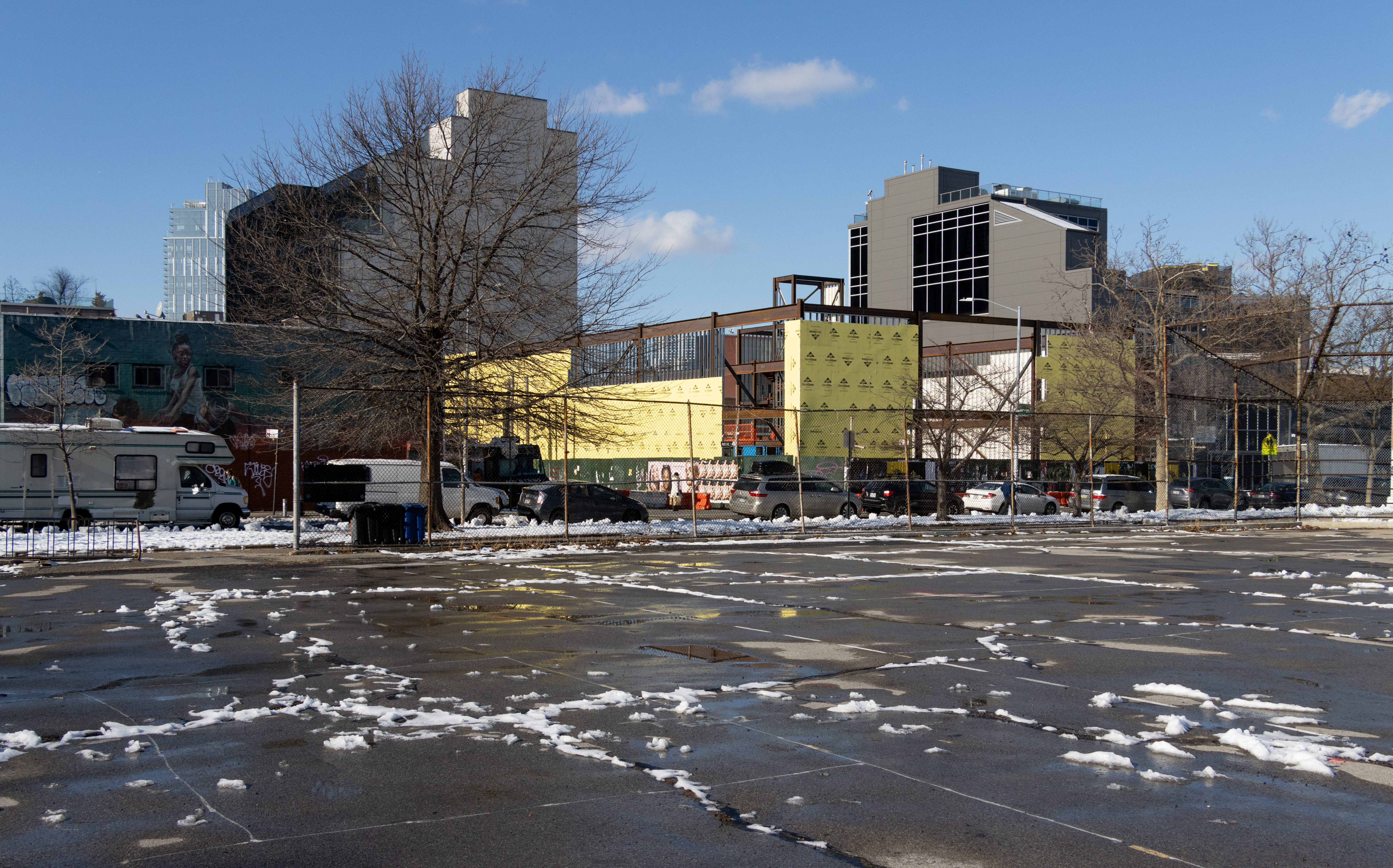 asphalt lot with snow